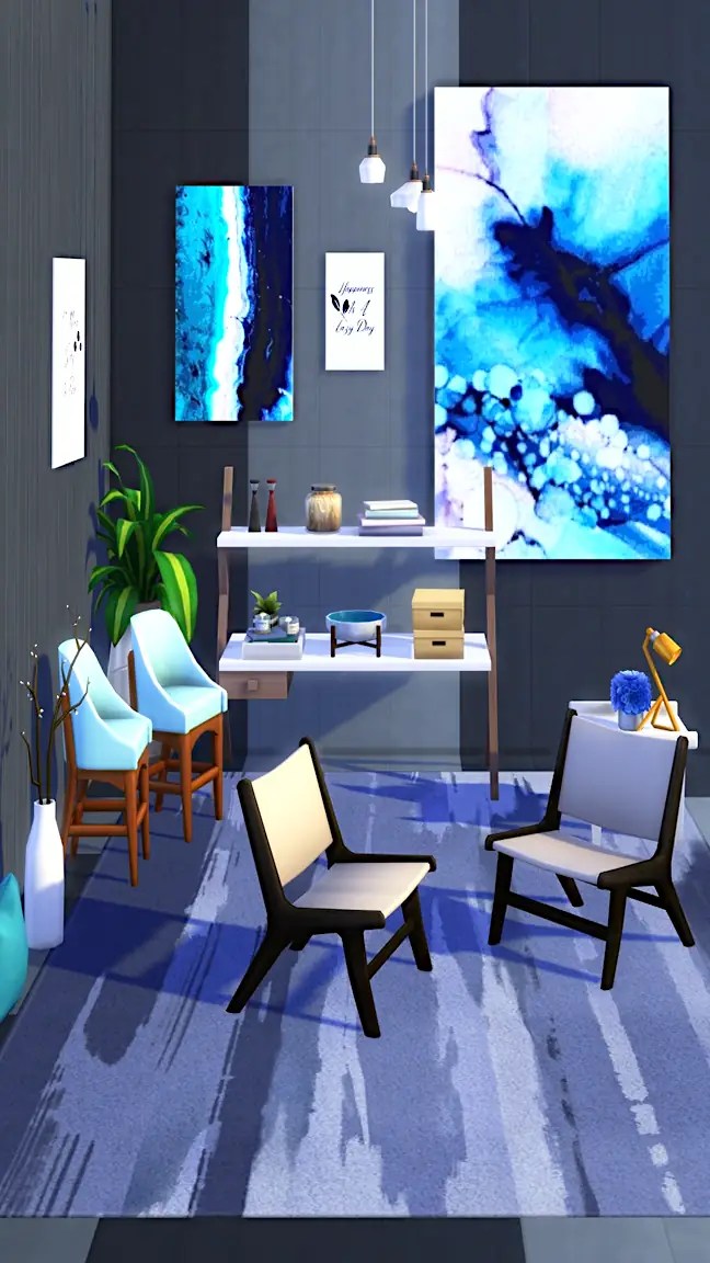 A modern interior room featuring a blue and grey colour scheme, with abstract artwork on the walls, a small desk with books and decorative items, two minimalist chairs, and potted plants.