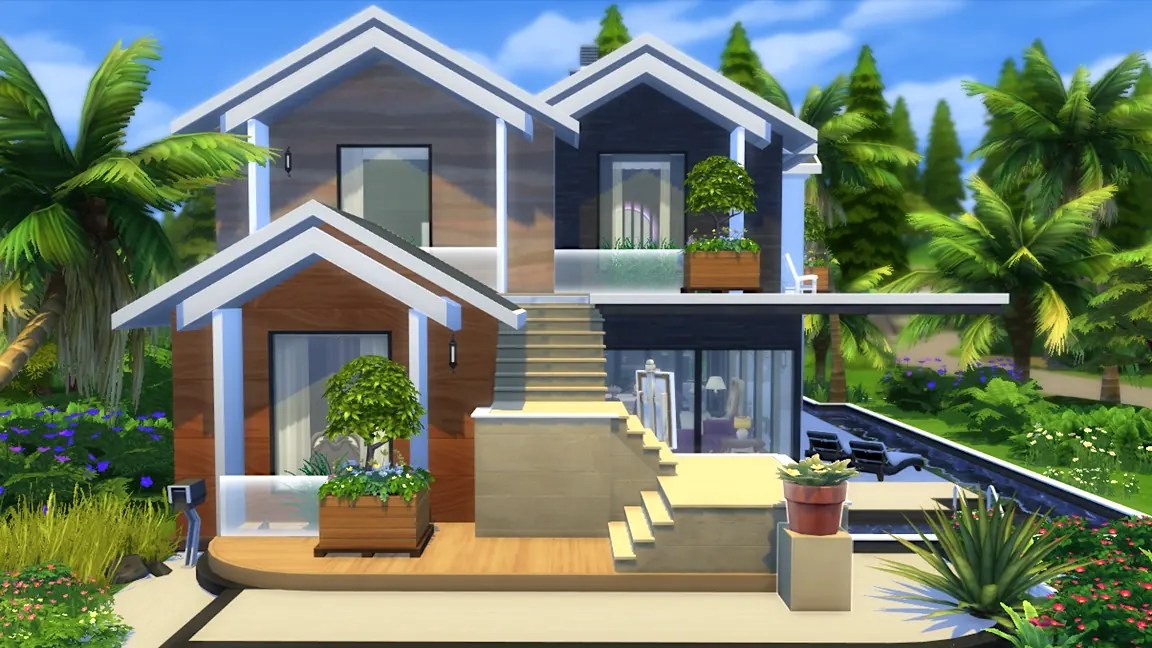 A modern two-storey house with a sleek design, featuring wooden and dark exterior walls. The entrance has a staircase leading up to a balcony surrounded by potted plants, with palm trees and colourful flowers in the garden.