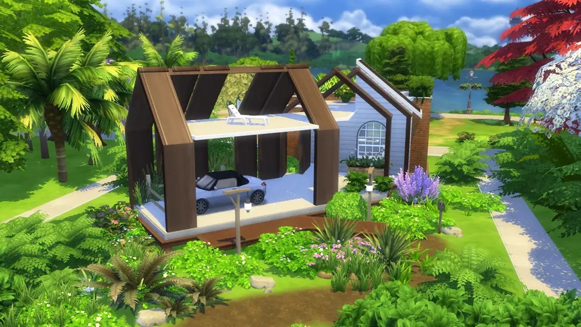 A modern, partially constructed house surrounded by lush greenery and tropical plants, featuring a small car parked inside and a deck chair on the upper level.