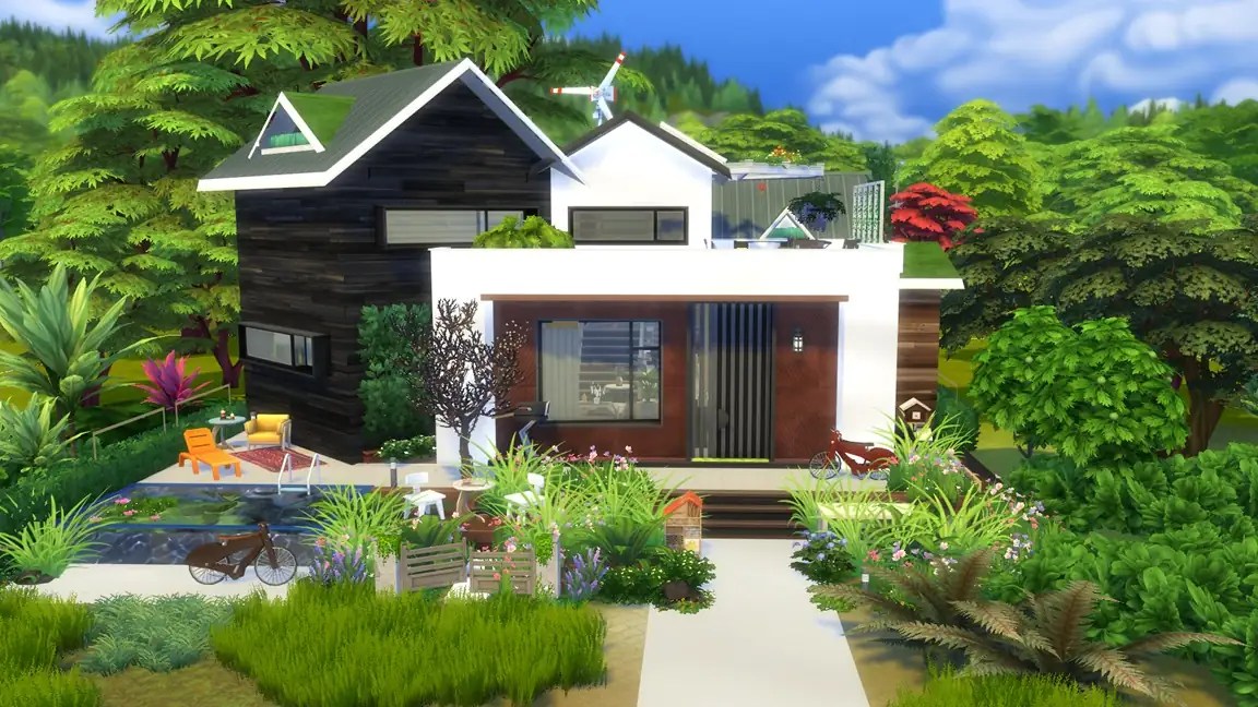 A modern two-storey house surrounded by lush greenery and colourful flowers, featuring a mix of black wooden and white exterior, large windows, and a spacious garden area with a pond and outdoor seating.