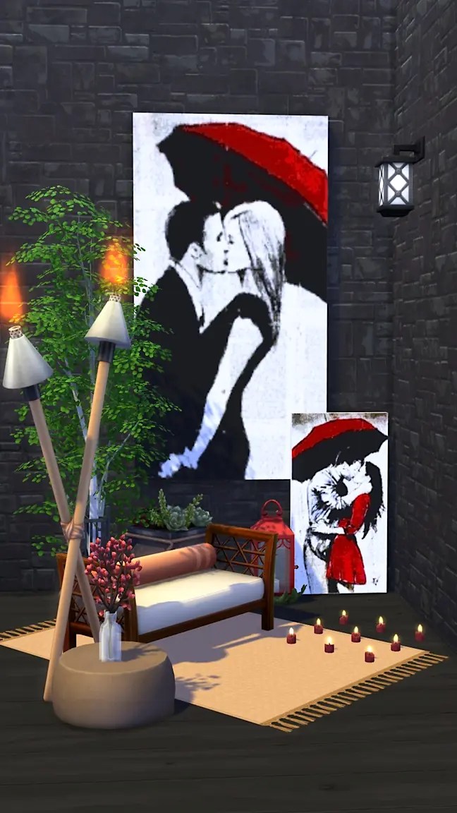 A cozy interior scene featuring two large paintings of a couple kissing under an umbrella, surrounded by decorative plants, a lantern, and candles on a rug.