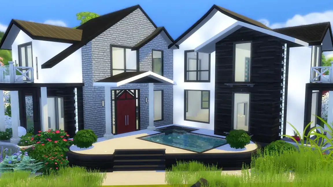 Modern two-storey house with a combination of black and white exterior, featuring large windows, a red front door, and a small swimming pool surrounded by greenery.